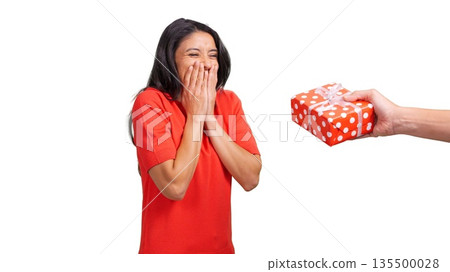 Woman receiving surprise gift feeling joy and happiness 135500028