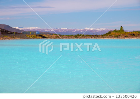 The Blue Lake appears along the main road on the outskirts of Reykjahlid, a town in the northern part of the Nordic island nation of Iceland. 135500426
