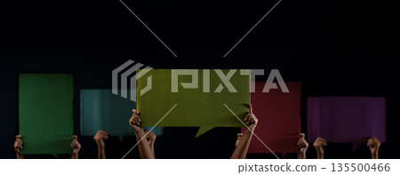 Group of Hands holding cardboard protest signs. Activism 135500466