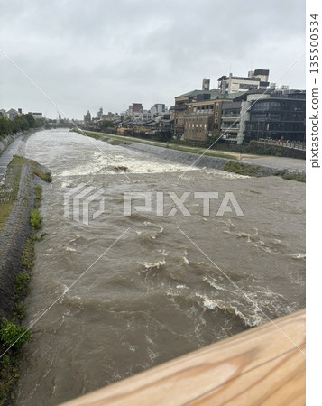 Rising waters of the Kamo River 135500534