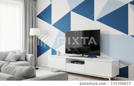 Geometric Accent Wall - A living room with a geometric-patterned wall behind the TV, using triangles in shades of blue Geometric Accent Wall - A living room with a geometric-patterned wall behind the TV, using triangles in shades of blue 135500637
