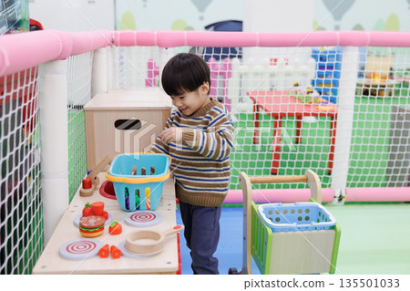Boy playing house Boy playing house 135501033