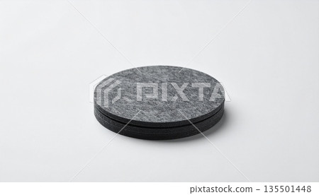 Coasters on a charcoal background 135501448