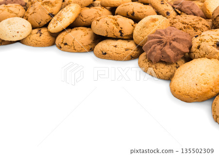 Cookies background frame isolated on white, copy space. Chocolate chips biscuits heap 135502309