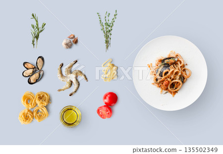 Cooking italian food, seafood pasta, isolated on blue. Frutti di mare with fettuccine spaghetti. Mussels, prawn, shrimp, calamari rings and other ingredients around plate with dish Cooking italian food, seafood pasta, isolated on blue. Frutti di mare with fettuccine spaghetti. Mussels, prawn, shrimp, calamari rings and other ingredients around plate with dish 135502349