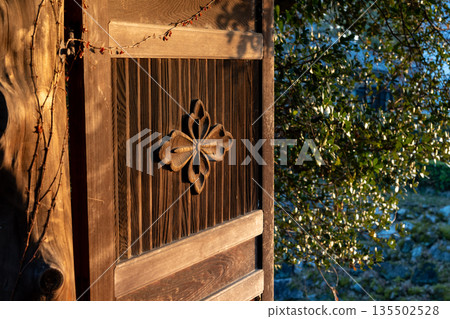 Commercial photography permission obtained: Yamatokoriyama Castle, a view of a door with a family crest on the side of the remains of the Bamboo Forest Bridge turret 135502528
