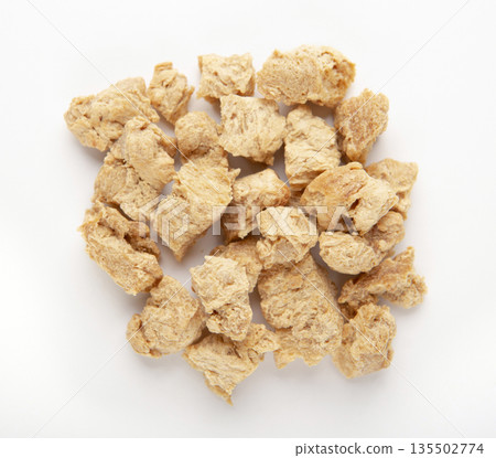 Alternative meat concept. Pile of soymeat protein isolated on white background, top view 135502774