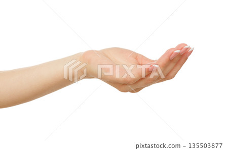 Female hand keeping empty cupped palm, close-up, cutout, isolated on white background. Offering or begging concept. Female hand keeping empty cupped palm, close-up, cutout, isolated on white background. Offering or begging concept. 135503877
