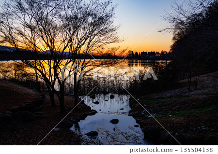 Beautiful Mount Fuji at dawn over Lake Tanuki in early winter 135504138