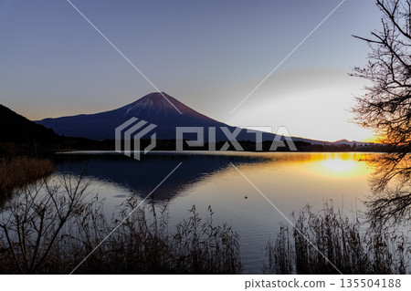 Beautiful Mount Fuji at dawn over Lake Tanuki in early winter 135504188