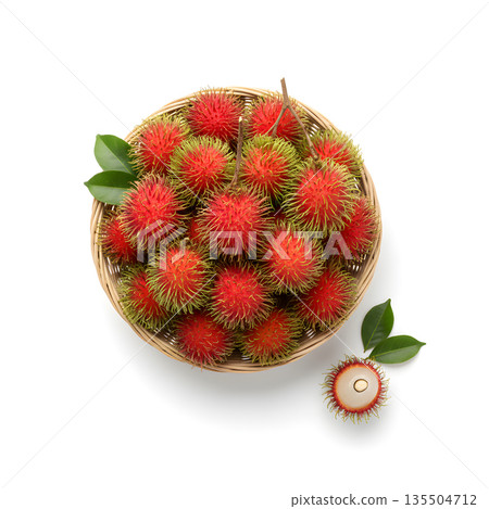 Rambutan Fruit Top view of a basket filled with ripe rambutans. 135504712