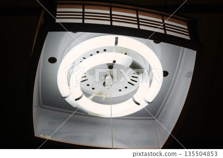 Indoor lighting with fluorescent lamps turned on 135504853