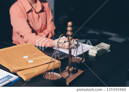 Consultation and conference of professional businesswoman and Male lawyers working and discussion having at law firm in office. Concepts of law, Judge gavel with scales of justice Consultation and conference of professional businesswoman and Male lawyers working and discussion having at law firm in office. Concepts of law, Judge gavel with scales of justice 135505988