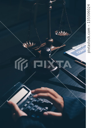 Consultation and conference of professional businesswoman and Male lawyers working and discussion having at law firm in office. Concepts of law, Judge gavel with scales of justice 135506024