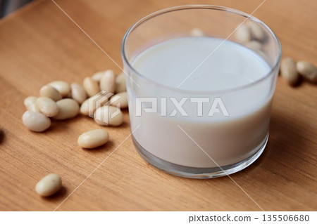 Steamed soybeans and soy milk in a glass Steamed soybeans and soy milk in a glass 135506680