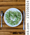 Broccoli sprouts arranged in a heart shape 135506924