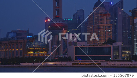 Iconic Shanghai Landmarks Captured During Evening Glow with City Lights Shining 135507079