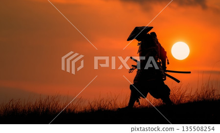 Silhouette of warrior with swords walking on hilltop against vibrant sunset background 135508254