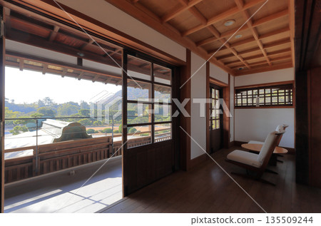 The balcony on the second floor of the main building of the Commerce and Industry Promotion Hall in Ritsurin Garden, overlooking the south garden The balcony on the second floor of the main building of the Commerce and Industry Promotion Hall in Ritsurin Garden, overlooking the south garden 135509244