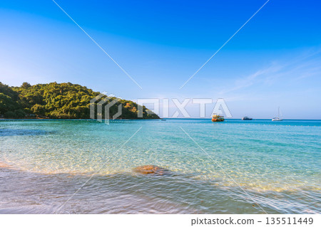 Beautiful panoramic view of the turquoise sea and lush green hills at Ao Prao, Koh Samed, Rayong, Thailand Beautiful panoramic view of the turquoise sea and lush green hills at Ao Prao, Koh Samed, Rayong, Thailand 135511449