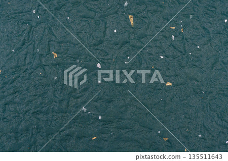 Background material of gold and silver grains scattered on deep blue-green Japanese paper 135511643