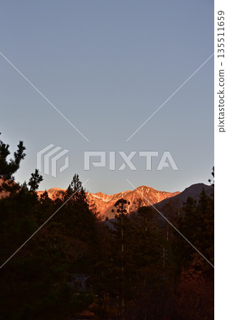 Senjojiki Cirque in the Central Alps bathed in the morning glow 135511659