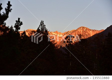 Senjojiki Cirque in the Central Alps bathed in the morning glow 135511660