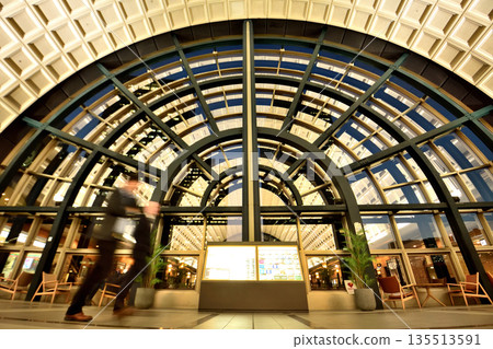 Tennozu Building where the afternoon sun shines in and the shadow of the circle window is reflected Tennozu Building where the afternoon sun shines in and the shadow of the circle window is reflected 135513591