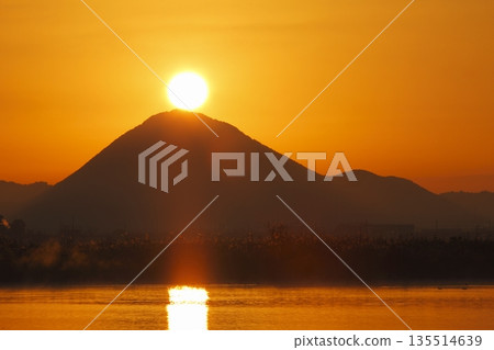 Mount Mikami at sunrise as seen from Lake Kihamauchi Mount Mikami at sunrise as seen from Lake Kihamauchi 135514639