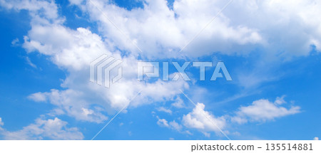 Bright blue sky with fluffy white cumulus clouds Bright blue sky with fluffy white cumulus clouds 135514881