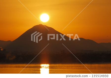 Mount Mikami at sunrise as seen from Lake Kihamauchi Mount Mikami at sunrise as seen from Lake Kihamauchi 135514930