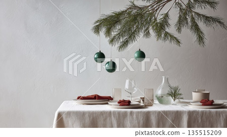 Elegant holiday table decor with green baubles and pine branches for festive dining 135515209
