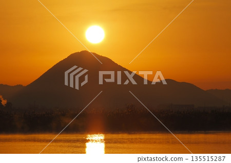 Mount Mikami at sunrise as seen from Lake Kihamauchi Mount Mikami at sunrise as seen from Lake Kihamauchi 135515287