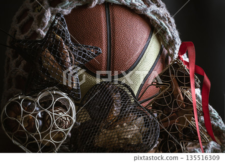 Basketball ball inside of mesh net string decoration with Christmas tree mesh case, Heart mesh case and Star mesh case. 135516309