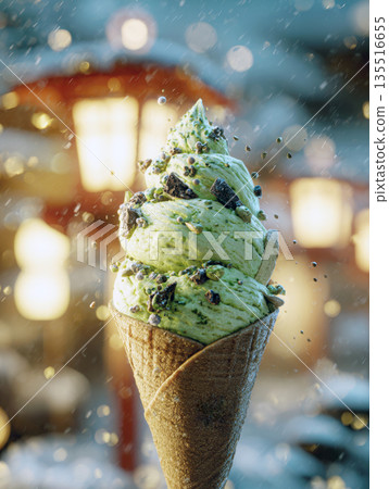 A single pistachio, mint green ice cream cone soft serve topped with chocolate pieces and nuts, held outdoors on a cold, snowy day with warm holiday lights and bokeh creating festive, sweet atmosphere A single pistachio, mint green ice cream cone soft serve topped with chocolate pieces and nuts, held outdoors on a cold, snowy day with warm holiday lights and bokeh creating festive, sweet atmosphere 135516655
