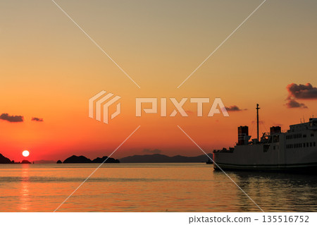 A fantastic view of Yawatahama Port in Ehime and the ferry moored there at sunset 135516752