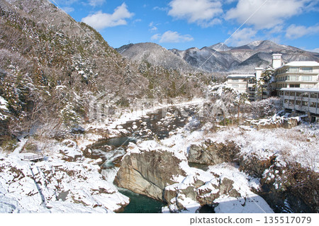 Kinugawa Onsen and Kinugawa River covered in snow in Nikko, Tochigi Prefecture Kinugawa Onsen and Kinugawa River covered in snow in Nikko, Tochigi Prefecture 135517079