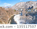 Kinugawa Onsen and Kinugawa River covered in snow in Nikko, Tochigi Prefecture 135517507