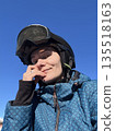 Woman Taking Selfie Wearing Ski Helmet Goggles 135518163
