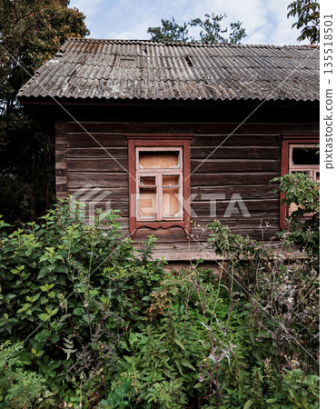 facade of an abandoned old wooden house facade of an abandoned old wooden house 135518501