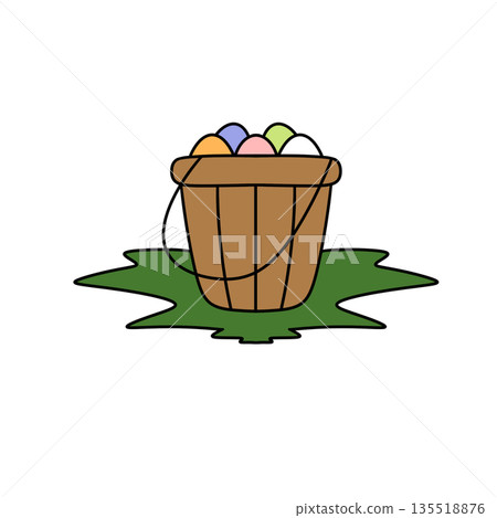 A basket of eggs is sitting on the grass 135518876