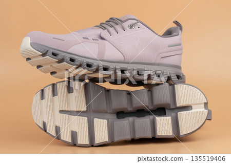 Pair of pink sport shoes Pair of pink sport shoes 135519406