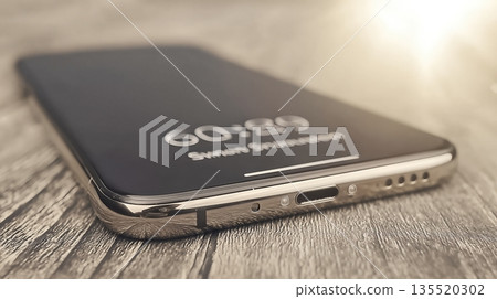 Smartphone Turned off With Timer Display in Focus While Resting on Wooden Surface Smartphone Turned off With Timer Display in Focus While Resting on Wooden Surface 135520302