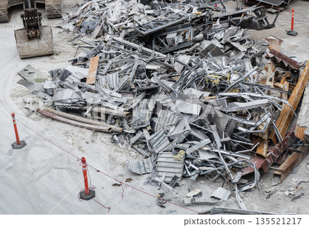 Aluminum industry extrusion at building construction site. Aluminum building system. Aluminum extrusion profile. Construction site storage with aluminum tubes. Steel extrusion. Industry material Aluminum industry extrusion at building construction site. Aluminum building system. Aluminum extrusion profile. Construction site storage with aluminum tubes. Steel extrusion. Industry material 135521217