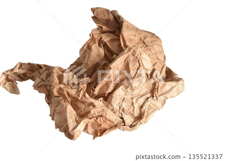 A crumpled brown paper ball. A crumpled brown paper ball. 135521337