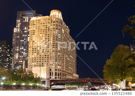 Chicago architecture of skyscraper. City night illuminated building. Skyscraper cityscape. Night city of Chicago. Business city. Night cityscape of Chicago skyscraper building. Twinkling windows Chicago architecture of skyscraper. City night illuminated building. Skyscraper cityscape. Night city of Chicago. Business city. Night cityscape of Chicago skyscraper building. Twinkling windows 135521480