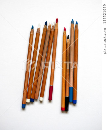 Multicolored pencils isolated on white background, top view. Wooden colorful pencils on a white table. Back to school. 135521959