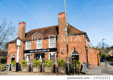 Historic brick buildings under bright sunlight in Richmond, a suburb of London 135522221