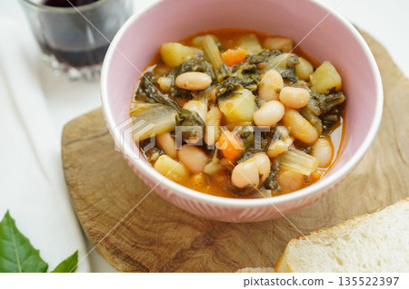 Minestrone: Vegetable and bean soup, Italian home cooking Minestrone: Vegetable and bean soup, Italian home cooking 135522397