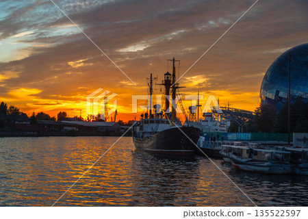 Pregolya River and ships in Kaliningrad at sunset. Russia 135522597